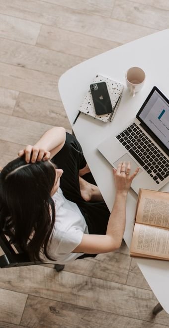 Photo by Vlada Karpovich: https://www.pexels.com/photo/young-lady-using-laptop-at-table-in-modern-workspace-4050320/